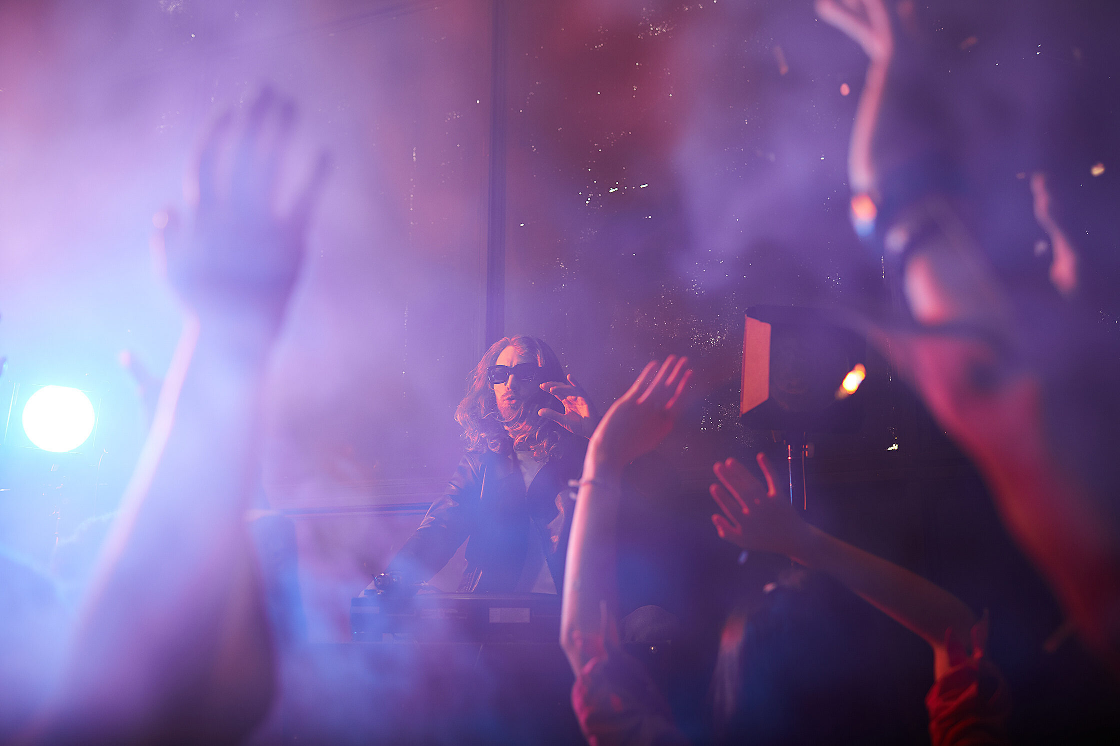 popular-dj-playing-at-party
